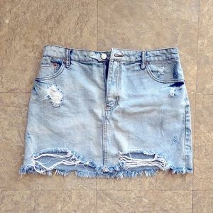 Distressed denim miniskirt